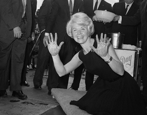 By now Doris was an international star and was honored with her hand prints at Grauman's Chinese Theater.